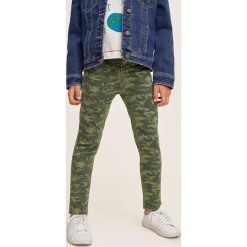 Mango Kids - Spodnie dziecięce Camou 110-164 cm. Żółte spodnie dziewczęce Mango Kids, z elastanu, casualowe. W wyprzedaży za 35,90 zł.