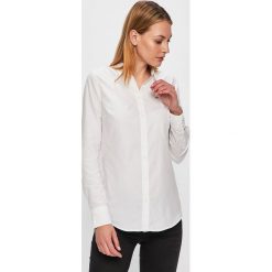 Tommy Jeans - Koszula. Niebieskie bluzki damskie Tommy Jeans, s, bez wzorów, z bawełny, bez kołnierzyka, z długim rękawem. Za 299,90 zł.