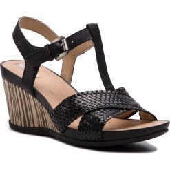 Sandały GEOX - D Dorotha E D928TE 0819D C9999 Black. Czarne klapki damskie Geox, bez wzorów, ze skóry, bez obcasa, na obcasie. W wyprzedaży za 339,00 zł.