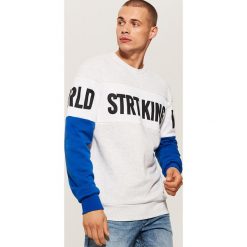 Bluza z napisami - Jasny szar. Szare bluzy męskie rozpinane marki House, l, z napisami. Za 79,99 zł.