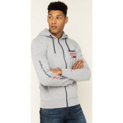 Bluza Tommy Jeans Tjm Essential Graphic Zip Trogh DM0DM07415. Niebieskie bluzy męskie Tommy Jeans, m, bez wzorów, z jeansu, bez kołnierzyka, bez rękawów, bez kaptura. W wyprzedaży za 319,00 zł.