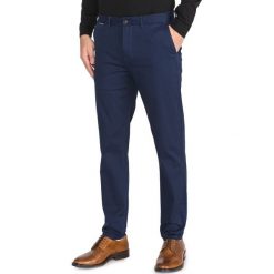 Scotch & Soda Mott Spodnie Niebieski. Niebieskie spodnie męskie Scotch & Soda, bez wzorów, z elastanu. Za 400,95 zł.