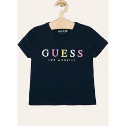 Guess Jeans - T-shirt dziecięcy 118-175 cm. Niebieskie bluzki dziewczęce Guess Jeans, z nadrukiem, z elastanu, z okrągłym kołnierzem, z krótkim rękawem, krótkie, bez kaptura. W wyprzedaży za 69,90 zł.