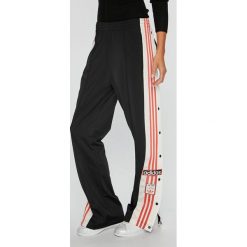 Adidas Originals - Spodnie Og Track Pants. Czarne spodnie damskie adidas Originals, z poliesteru. W wyprzedaży za 249,90 zł.
