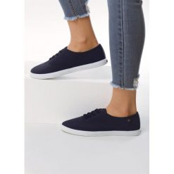Granatowe Tenisówki Tronia. Niebieskie trampki i tenisówki damskie Born2be, bez wzorów, z tkaniny, na sznurówki. Za 49,99 zł.