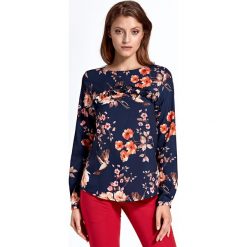Bluzka z falbanką w kwiaty granat. Bluzki damskie e-margeritka.pl, s, w kwiaty, z elastanu, eleganckie, z falbankami, z długim rękawem. Za 118,99 zł.