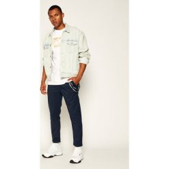 Spodnie materiałowe Tommy Jeans Tjm Scanton Solid DM0DM07826. Niebieskie jeansy męskie Tommy Jeans, m, bez wzorów. W wyprzedaży za 309,00 zł.
