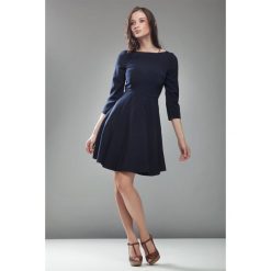 Sukienka z koła w kolorze granatowym. Sukienki dziewczęce NIFE, na zimę, bez wzorów, z elastanu, eleganckie, bez rękawów. Za 179,00 zł.