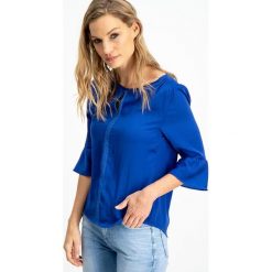 Bluzka w kolorze niebieskim. Niebieskie bluzki damskie Garcia, l, bez wzorów, bez kołnierzyka, bez rękawów. W wyprzedaży za 65,95 zł.