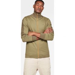Bluza w kolorze zielonym. Zielone bluzy męskie G-Star, s, z nadrukiem, z bawełny, ze stójką, bez rękawów, bez kaptura. W wyprzedaży za 219,95 zł.