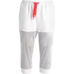 Spodnie dresowe damskie: adidas Performance Rybaczki sportowe white