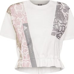 T-shirt ADIDAS BY STELLA McCARTNEY GRAPHIC. Białe topy damskie adidas by Stella McCartney, z nadrukiem, z bawełny, z krótkim rękawem, na fitness i siłownię. Za 270,00 zł.