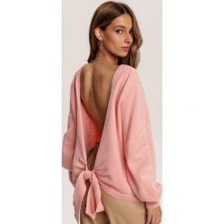 Jasnoróżowy Sweter Meridieth. Różowe swetry damskie Renee, s, bez wzorów, casualowe, bez rękawów, bez kaptura. Za 129,99 zł.