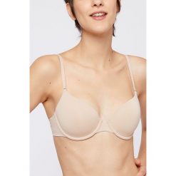 Etam - Biustonosz Pure Fit. Białe biustonosze Etam, z haftami, z elastanu. W wyprzedaży za 99,90 zł.