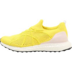 Buty sportowe damskie: adidas by Stella McCartney ULTRA BOOST UNCAGED Obuwie do biegania treningowe vivid yellow/white