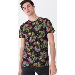 T-shirt z nadrukiem Rick and Morty - Czarny. Czarne t-shirty męskie House, s, z nadrukiem. Za 49,99 zł.