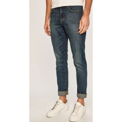 Izod - Jeansy Saltwater. Niebieskie jeansy męskie IZOD, bez wzorów. W wyprzedaży za 139,90 zł.