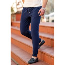 Męskie spodnie HAROLD NAVY. Niebieskie jeansy męskie IVET, na co dzień, m, bez wzorów, z jeansu, eleganckie. W wyprzedaży za 79,00 zł.