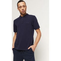 O'Neill Polo Koszulka Niebieski. Niebieskie podkoszulki męskie O'Neill, l, bez wzorów, z bawełny, bez rękawów. Za 180,95 zł.