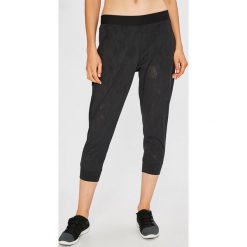 Under Armour - Legginsy TB Balance Mesh Loose Crop. Czarne legginsy marki Under Armour, s, z poliesteru, z obniżonym stanem. W wyprzedaży za 199,90 zł.
