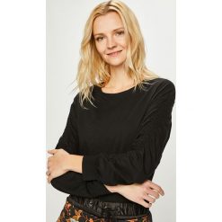 Trendyol - Bluzka. Czarne bluzki damskie Trendyol, s, bez wzorów, z bawełny, z okrągłym kołnierzem. W wyprzedaży za 34,90 zł.