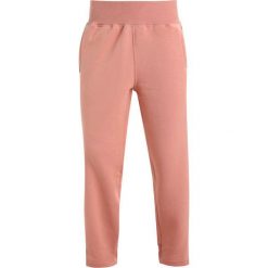 Bryczesy damskie: adidas by Stella McCartney Spodnie treningowe cinnamon blush