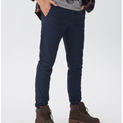 Spodnie jogger slim - Granatowy. Niebieskie spodnie męskie House, s. W wyprzedaży za 39,99 zł.