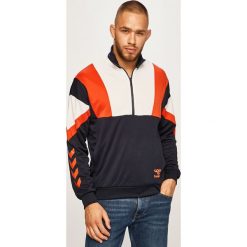 Hummel - Bluza. Niebieskie bluzy męskie Hummel, s, z nadrukiem, z poliesteru, bez kołnierzyka, z krótkim rękawem, krótkie, bez kaptura. W wyprzedaży za 199,90 zł.
