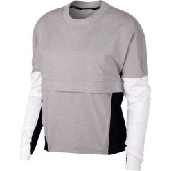 Bluza Nike Therma-Sphere Top W Czarno-Szara. Szare topy damskie Nike, bez wzorów, z tkaniny, bez rękawów, długie, bez kaptura, do biegania. Za 169,99 zł.