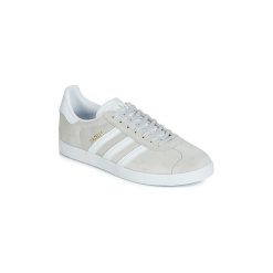 Buty adidas GAZELLE. Szare trampki i tenisówki damskie Adidas, bez wzorów, bez zapięcia. Za 419,00 zł.