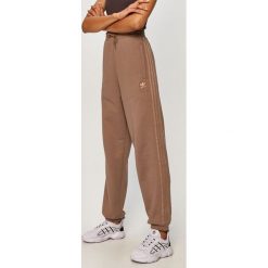 Adidas Originals - Spodnie. Brązowe spodnie damskie adidas Originals, z bawełny. Za 249,90 zł.