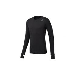 T-shirty z długim rękawem Reebok Sport Koszulka ThermoWarm LS Thermal. Czarne koszulki męskie Reebok Sport, xl, bez wzorów, bez kołnierzyka, z długim rękawem, długie. Za 249,00 zł.