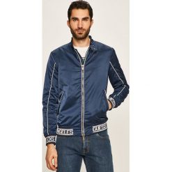 Guess Jeans - Kurtka. Niebieskie płaszcze męskie Guess Jeans, s, z aplikacjami, z poliesteru, krótkie, bez kaptura. Za 699,90 zł.