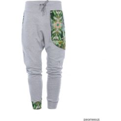 Spodnie dresowe damskie JUNGLE - baggy - szare. Szare spodnie damskie Pakamera, z nadrukiem, z dresówki. Za 179,00 zł.