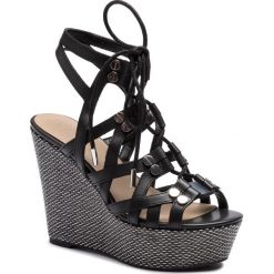 Espadryle GUESS - Gray FL6GRY LEA04 BLACK. Czarne espadryle damskie Guess, z aplikacjami, ze skóry ekologicznej, bez obcasa, na obcasie. W wyprzedaży za 499,00 zł.