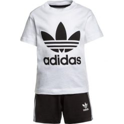 Adidas Originals SET Spodnie treningowe white/black. Białe spodnie chłopięce marki adidas Originals, z bawełny. Za 129,00 zł.
