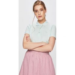 Lacoste - Top. Różowe bluzki damskie Lacoste, bez wzorów, z elastanu, casualowe, bez kołnierzyka, z krótkim rękawem. W wyprzedaży za 299,90 zł.