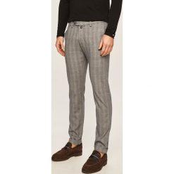 Pierre Cardin - Spodnie. Niebieskie spodnie męskie Pierre Cardin, na co dzień, z haftami, z elastanu, casualowe. Za 529,90 zł.