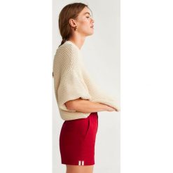 Mango - Szorty Chino. Pomarańczowe szorty damskie Mango, bez wzorów, z elastanu, casualowe. Za 69,90 zł.