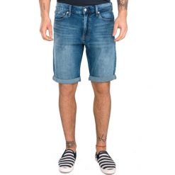 Calvin Klein Szorty Niebieski. Niebieskie spodenki i szorty męskie Calvin Klein, bez wzorów, z elastanu. Za 326,95 zł.