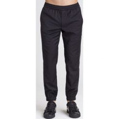 SPODNIE DRESOWE Armani Exchange. Czarne spodnie męskie Armani Exchange, na imprezę, m, bez wzorów, z dresówki. Za 426,30 zł.