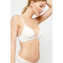 Etam - Biustonosz Pure 360. Białe biustonosze Etam, z haftami, z elastanu. W wyprzedaży za 114,90 zł.