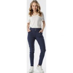 Granatowe Spodnie Melella. Niebieskie jeansy damskie Born2be, xl. W wyprzedaży za 44,99 zł.