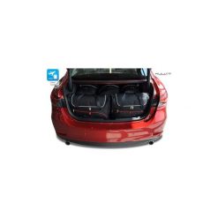MAZDA 6 SEDAN, 2012- TORBY DO BAGAŻNIKA 5 SZT KJUST - 7026015. Torby podróżne KJUST, bez wzorów, z kauczuku, klasyczne. Za 1409,00 zł.
