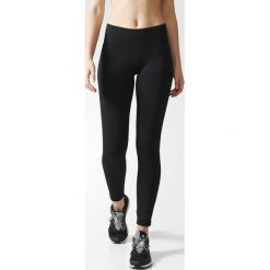 SPODNIE WO HR LONG TIGH. Czarne spodnie damskie Adidas, na lato, bez wzorów, z elastanu, na fitness i siłownię. Za 129,99 zł.