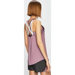 Under Armour - Top. Różowe topy damskie marki Under Armour, s, z elastanu. Za 129,90 zł.
