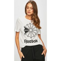 Reebok Classic - Top. Białe topy damskie Reebok Classic, s, z nadrukiem, z elastanu, z okrągłym kołnierzem. W wyprzedaży za 99,90 zł.