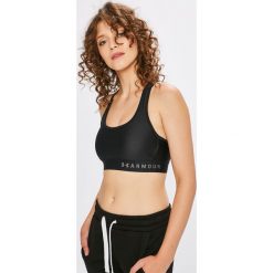 Under Armour - Biustonosz. Czarne biustonosze sportowe damskie marki Under Armour, xs, z elastanu. Za 139,90 zł.