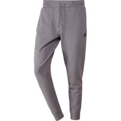 McQ Alexander McQueen Spodnie treningowe grey melange. Szare spodnie męskie marki McQ Alexander McQueen, m, bez wzorów, z bawełny. Za 879,00 zł.