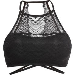 Biustonosz bustier z tyłem bokserką bonprix czarny. Czarne biustonosze sportowe damskie bonprix, w paski, z koronki. Za 54,99 zł.